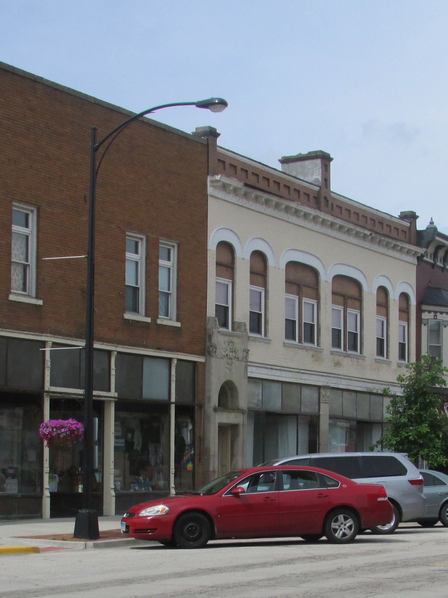Storefronts and a streetlamp in downtown Momence